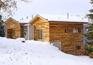 дом из штабелированного массивного лесоматериала