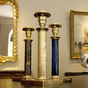 подсвечник из полированной латуни