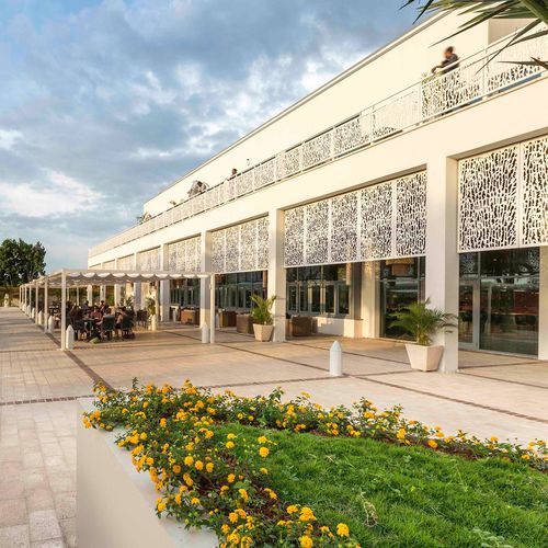 Декоративная панель для внешнего благоустройства - CELLON - MARRIOTT PORT-AU-PRINCE HAITI - Bruag Design Factory AG - настенная / из ламината высокого давления / перфорированная