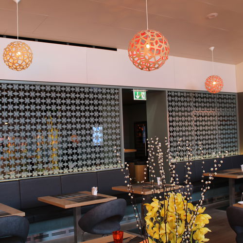 Декоративная панель для перегородки - HOSPITAL HIRSLANDEN RESTAURANT - Bruag Design Factory AG - из ламината высокого давления / перфорированная