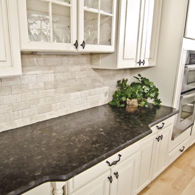 Рабочая поверхность из гранита - BROWN ANTIQUE - WALL GRANITE SERVICE SRL - для кухни / черная / с круглым краем