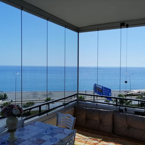 Складное панорамное окно - BALCONY SYSTEM - BKS balcony glazing systems - из алюминия / 3 створки / 2 створки