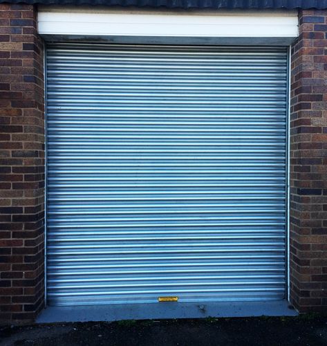 Роликовая ставня - Industrial Door Engineering - из гальванизированной стали / для двери / для обеспечения безопасности