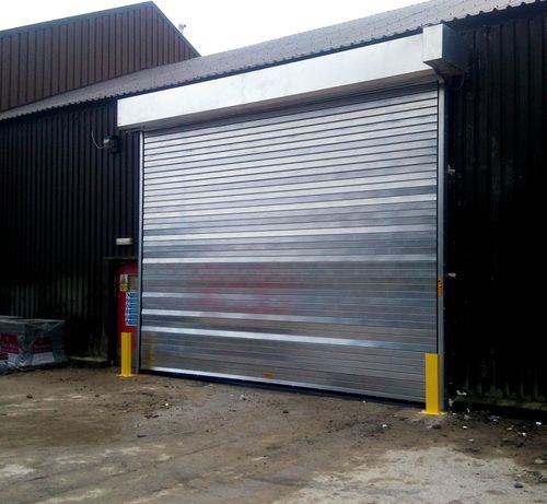 Роликовая ставня - Industrial Door Engineering - из гальванизированной стали / для двери / противошумная