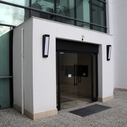 Современный настенный светильник - IPARK - BSI LIGHTING TECHNOLOGIES INC. - для сада / из литого алюминия / из нержавеющей стали