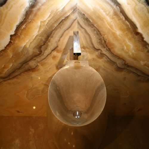 Умывальник для рук на столешнице - ROMAN TRAVERTINE SINK "NAIL" AND ONYX ARIS WALL - GIOVANNOZZI MARMI S.R.L. - круглый / из мрамора
