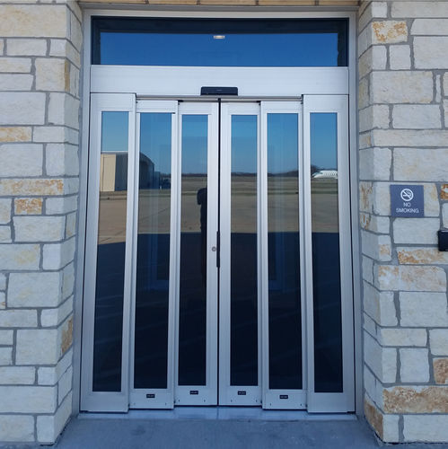 Система скольжения из металла - SL500 T67 - ASSA ABLOY Entrance Systems - для стеклянной двери / скрытые бегунки / для общественных учреждений