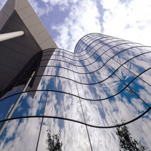 Закаленная стеклянная панель - HEAT-STRENGTHENED - Tambest Glass Solutions - прозрачная / для фасада / изогнутая