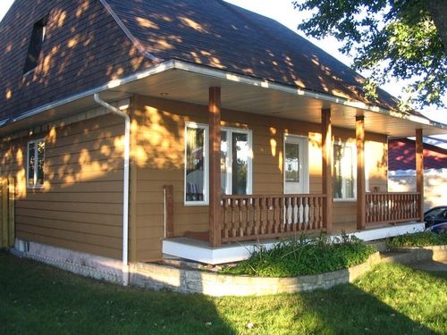 Облицовка фасада из реек - NOVIPLANK™ S8 - NOVIK - из полимера / пазованная / имитация дерева