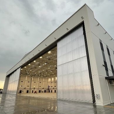 Раздвижное промышленные ворота - Moreschi Chiusure Industriali S.r.l. - из металла / акустическое / большая высота