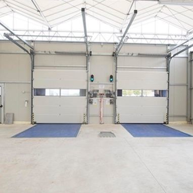 Дверь для интерьера - SECTIONAL DOORS - Moreschi Chiusure Industriali S.r.l. - из стали / из полиуретана / из гальванизированной стали