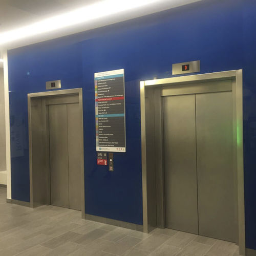 Покрытие для стен для внутреннего пространства - Specialist Joinery Group - из стекла / полированное / зеркальное