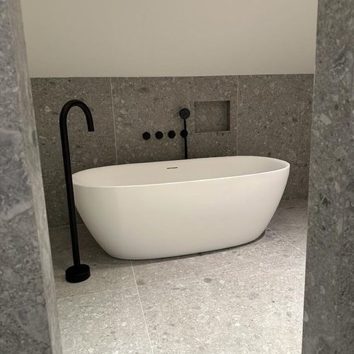 Овальная ванна - IKTO Design - отдельностоящая / для жилых зданий / из камня