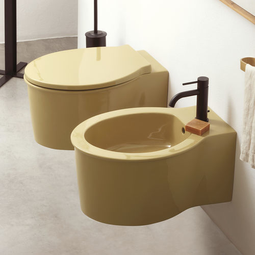 Подвесной унитаз - CATINO - ANEMONE - Ceramica Cielo - из керамики / для бытового использования / овальный