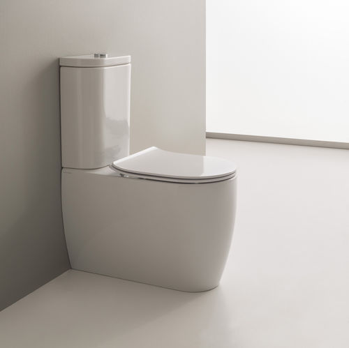 Унитаз моноблок - MOON MONOBLOCK - Scarabeo Ceramiche - из керамики / не определено / безободковый