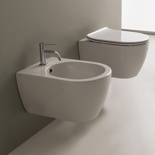 Подвесной унитаз - Moon - Scarabeo Ceramiche - из фарфора / не определено / для бытового использования