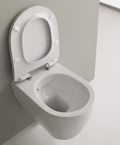 Подвесной унитаз - Moon Clean Flush - Scarabeo Ceramiche - из керамики / не определено / овальный