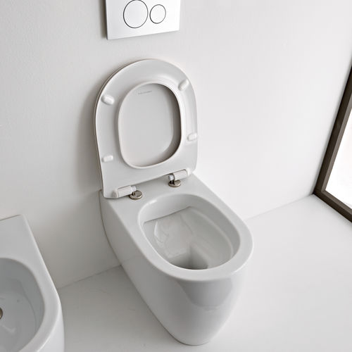 Подвесной унитаз - Moon Clean Flush - Scarabeo Ceramiche - из керамики / не определено / овальный