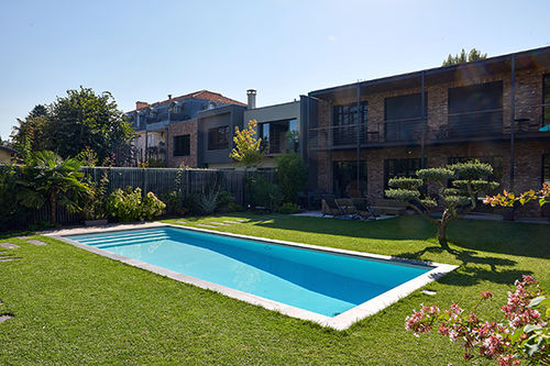 Бассейн для наружного применения - PISCINE FAMILIALE BORDEAUX - PISCINES CARRE BLEU - заглубленный / из минерального камня / со встроенной светодиодной подсветкой