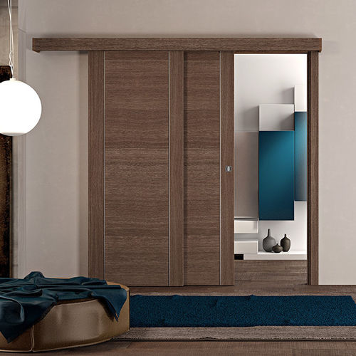 Дверь для интерьера - Infinita Rovere Mocaccino - PAIL SERRAMENTI - из ламината / телескопическая / современная