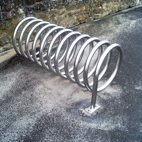 Напольная парковка для велосипедов - SPIRALE - FRANCE INOX INDUSTRIE - горизонтальная / для общественных мест / из нержавеющей стали