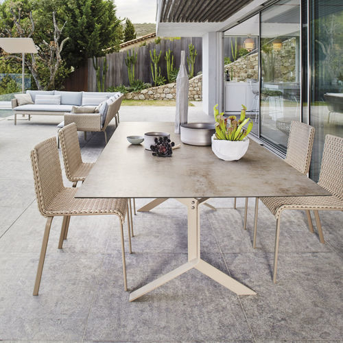 Современный обеденный стол - KEY WEST - Roberti Rattan - из нержавеющей стали / из ламината высокого давления / с основанием из нержавеющей стали