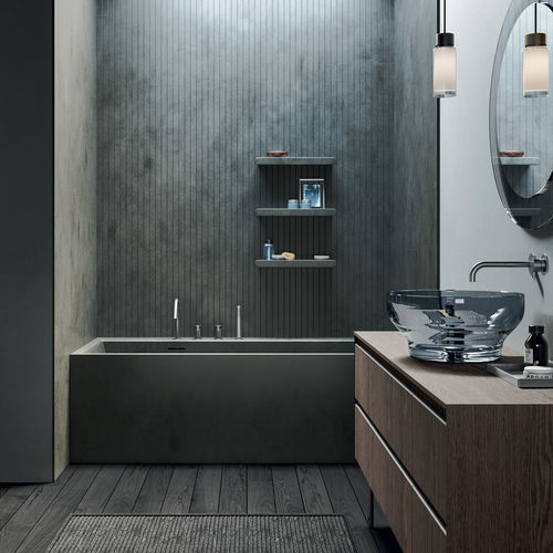 Отдельностоящая ванна - Unico - Rexa Design - приставная / для жилых зданий / из Corian®