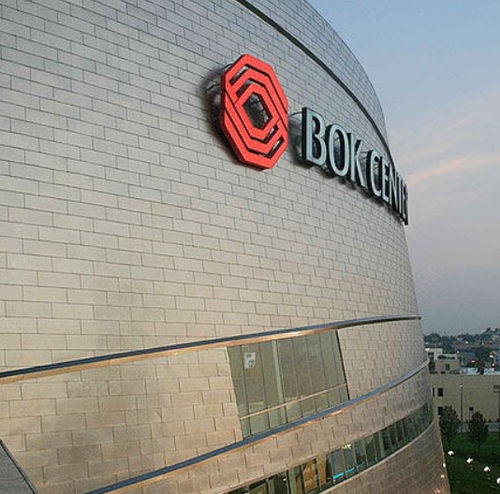 Панельная облицовка фасада - BOK CENTER - A. Zahner - из нержавеющей стали / вертикальная / отражающая