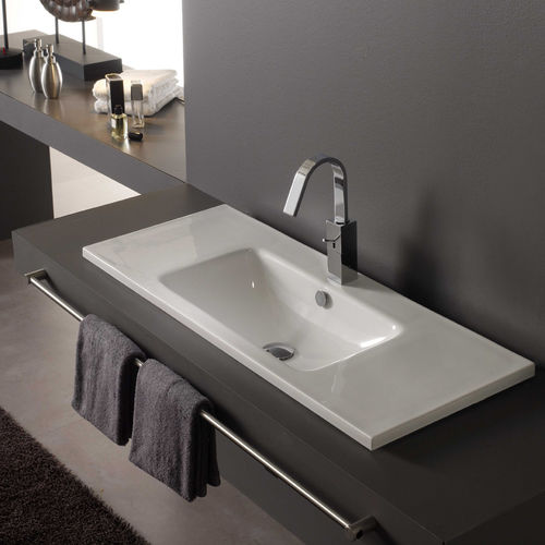 Встраиваемая раковина - NUEVO MONTEVIDEO - Bath Collection S.L. - из фарфора / со встроенной столешницей / прямоугольная