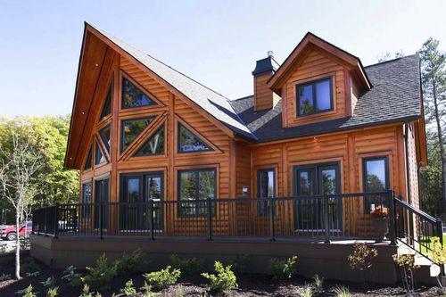 Дом из штабелированного массивного лесоматериала - Labrador - TIMBER BLOCK  - экологический / классический / двухэтажный