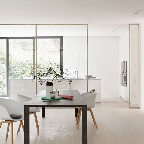Современная кухня - Villa Hamburg - eggersmann küchen GmbH & Co. KG - из Corian® / островного типа / без ручки
