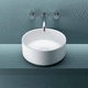настольная раковина / из Corian® / круглая / без отверстия